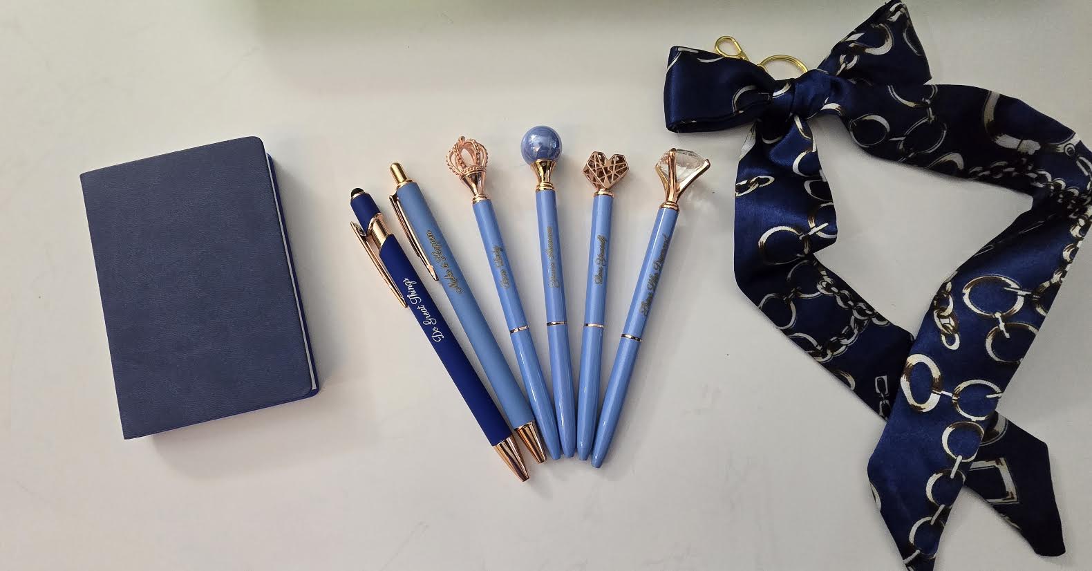 Six Boss Lady Engraved Pens in navy blue and gold with charm toppers